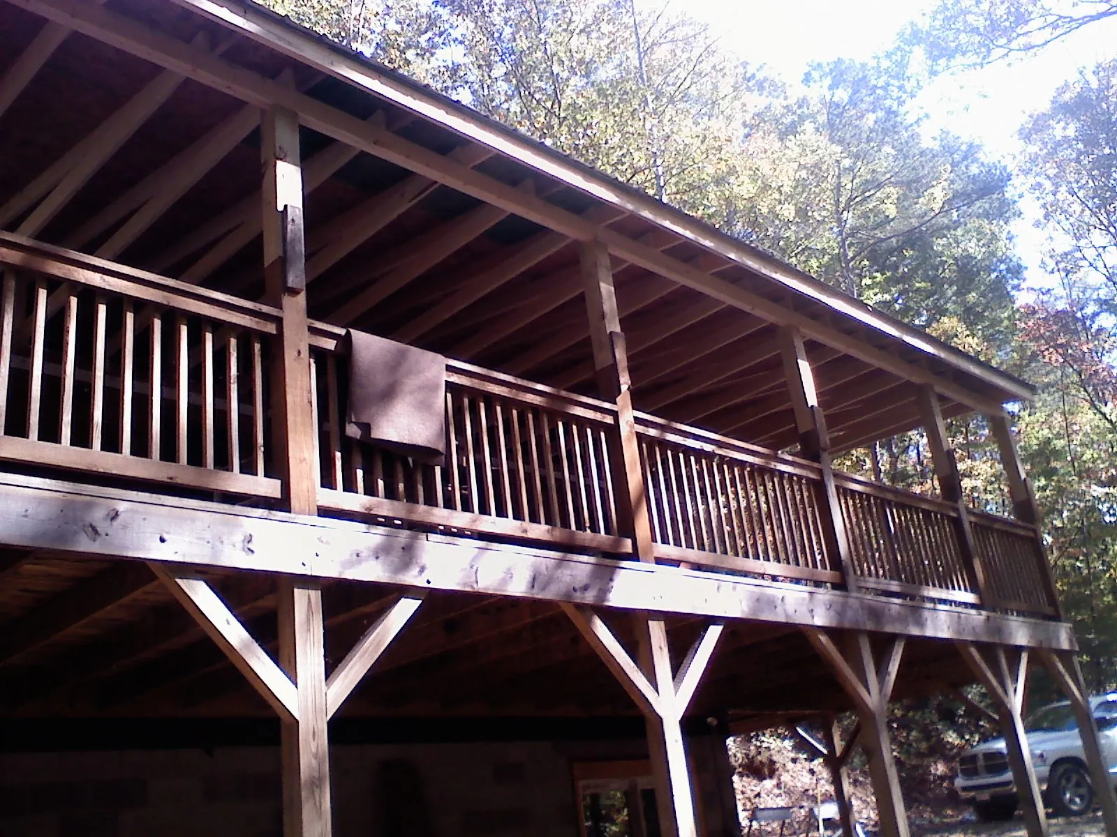Timber framing under a new elevated porch and deck — Roof Leak Repair in Jerseyville by Roofing Brothers
